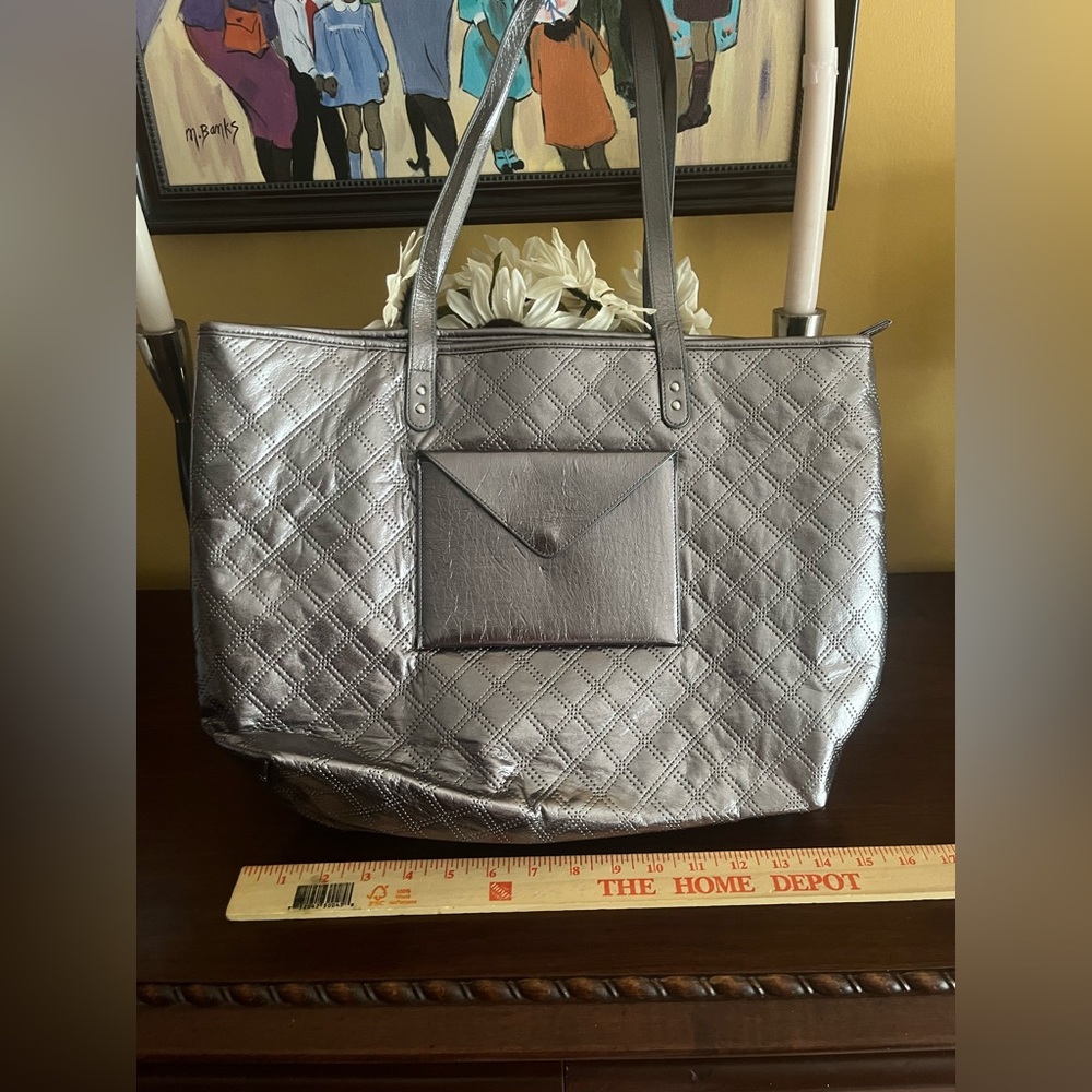 Bath and Body Works Silver Tote Faux Leather Bag! Outside pocket. Roomy.
